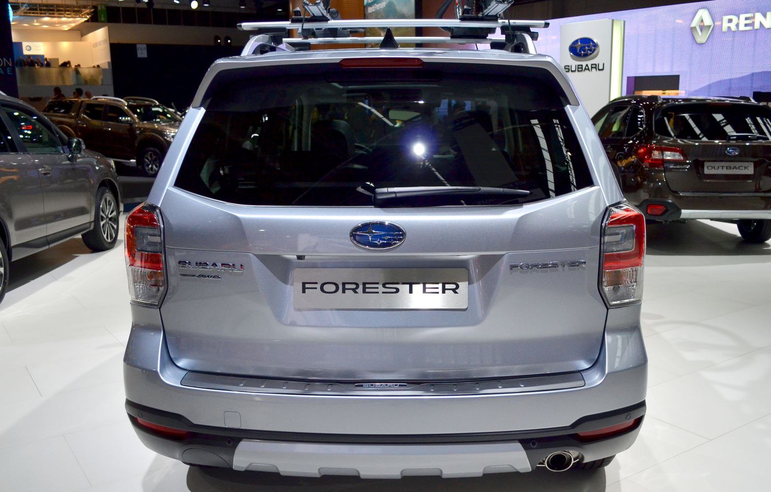 Rear view of SUV with tailgate, taillights, and exhaust pipe