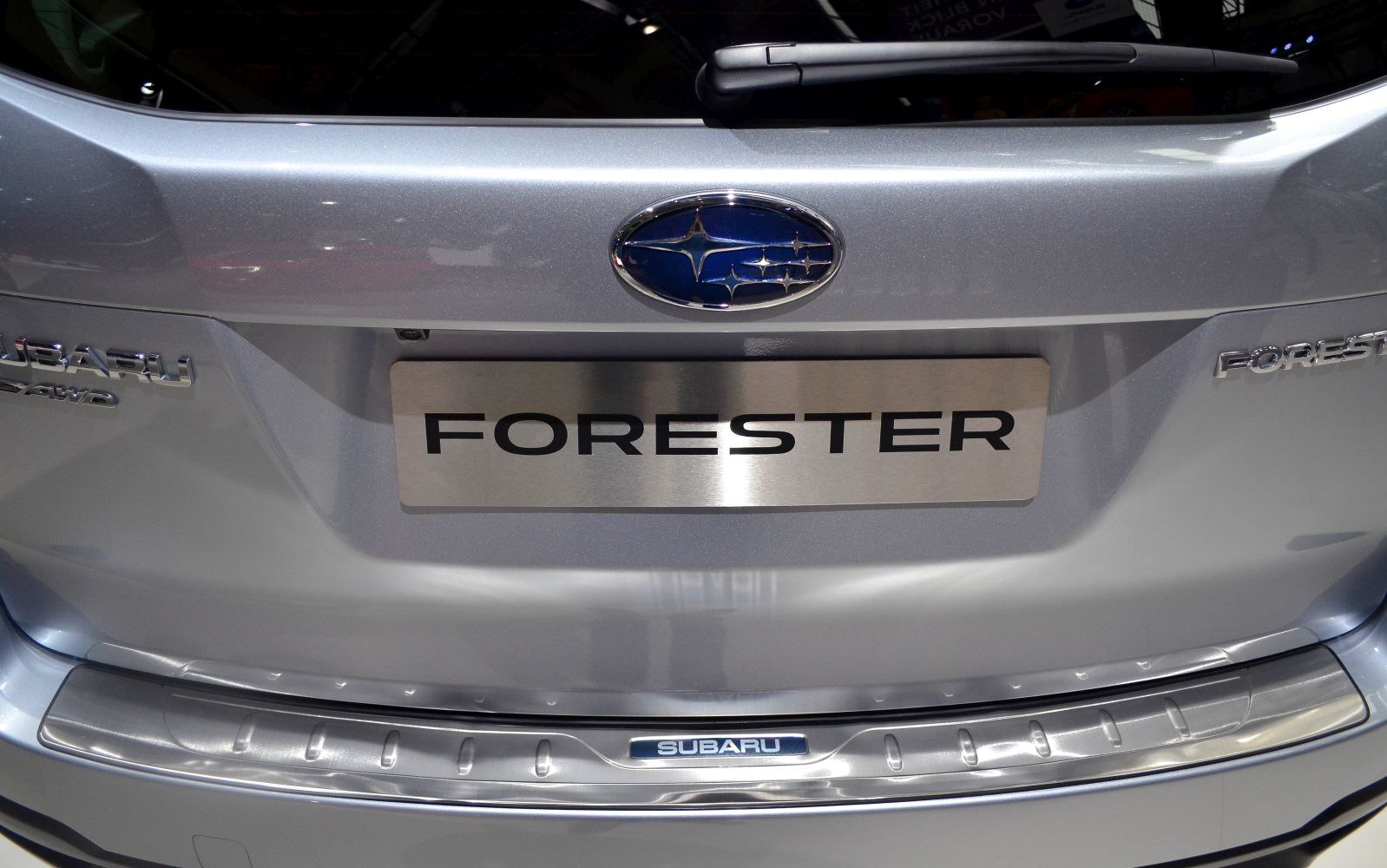 Close-up of Subaru Forester rear badges and metallic trim