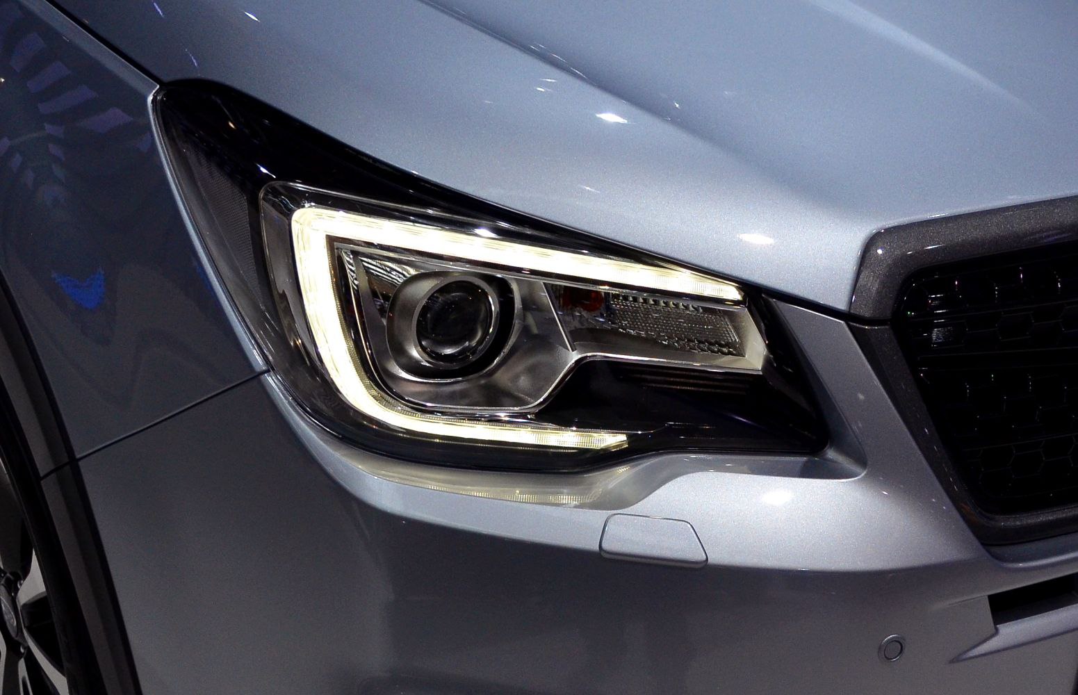 Close-up of Subaru SUV LED headlight with sharp design