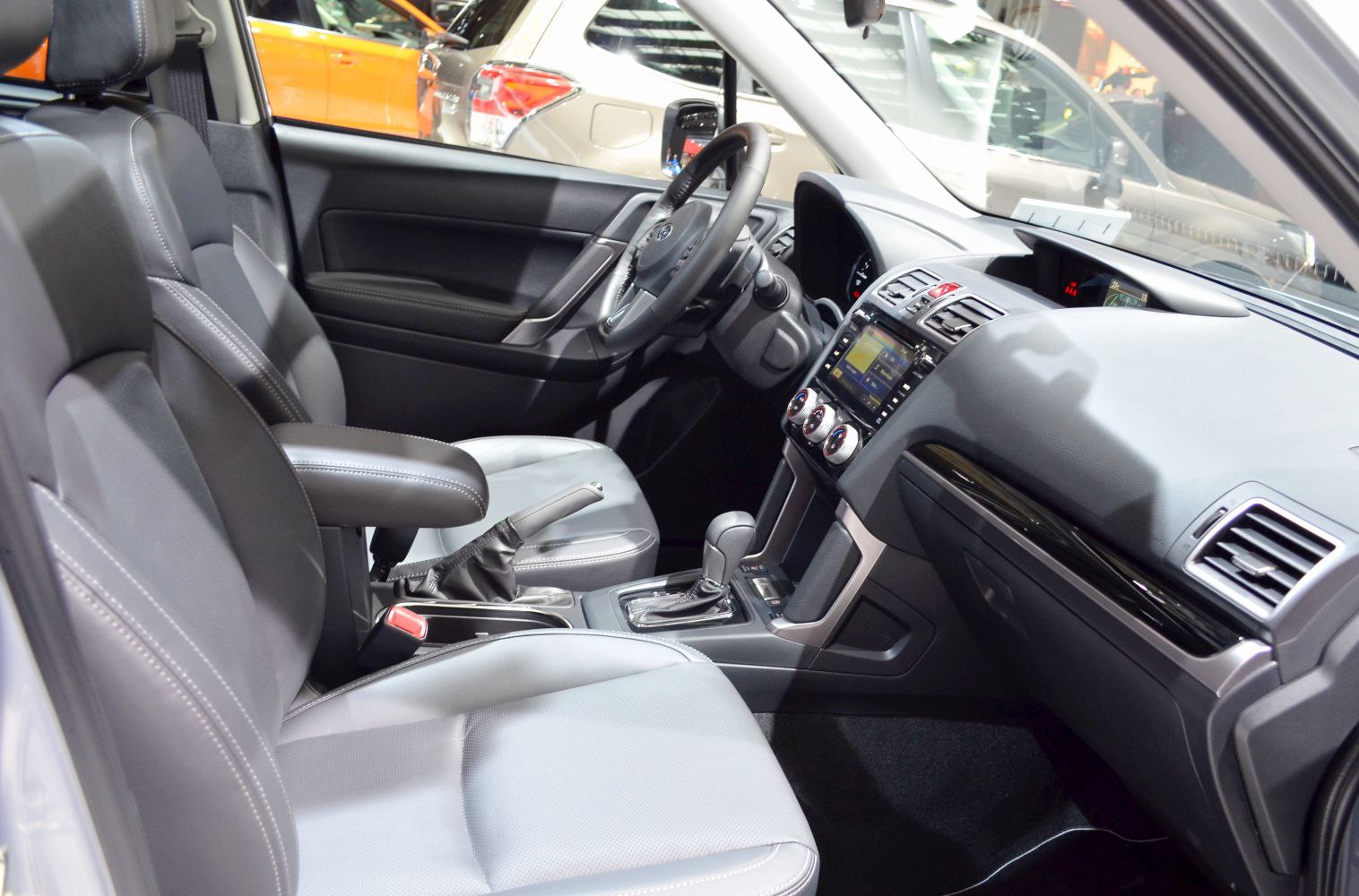 Modern interior with touchscreen infotainment and leather seats