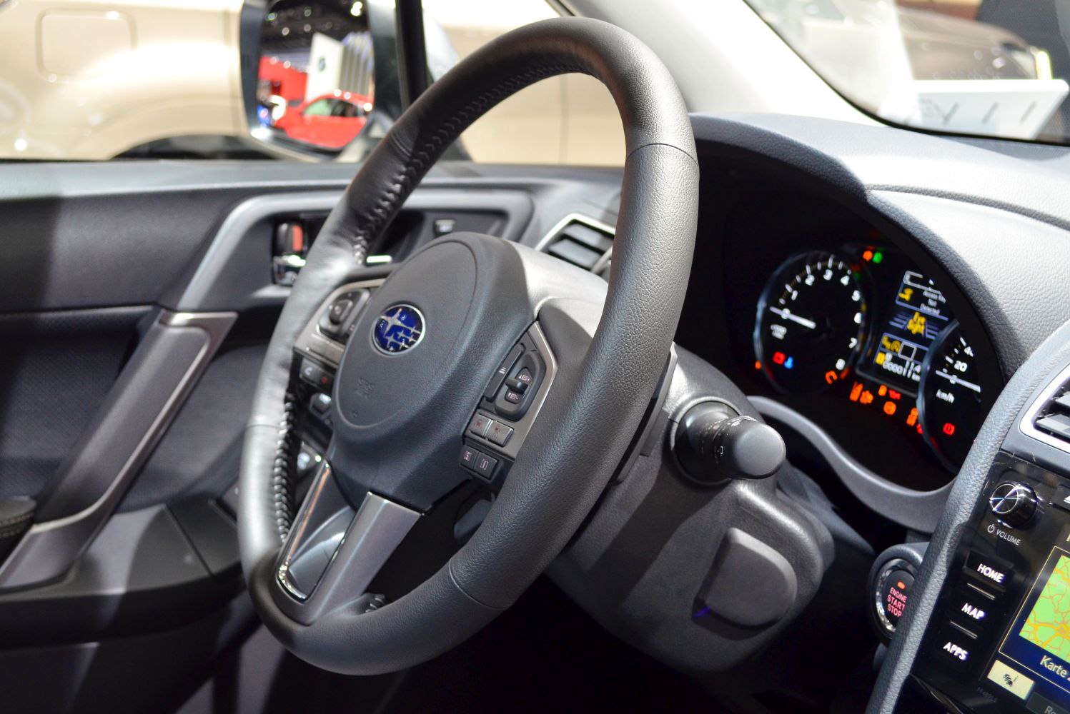 Multifunction steering wheel and digital instrument cluster