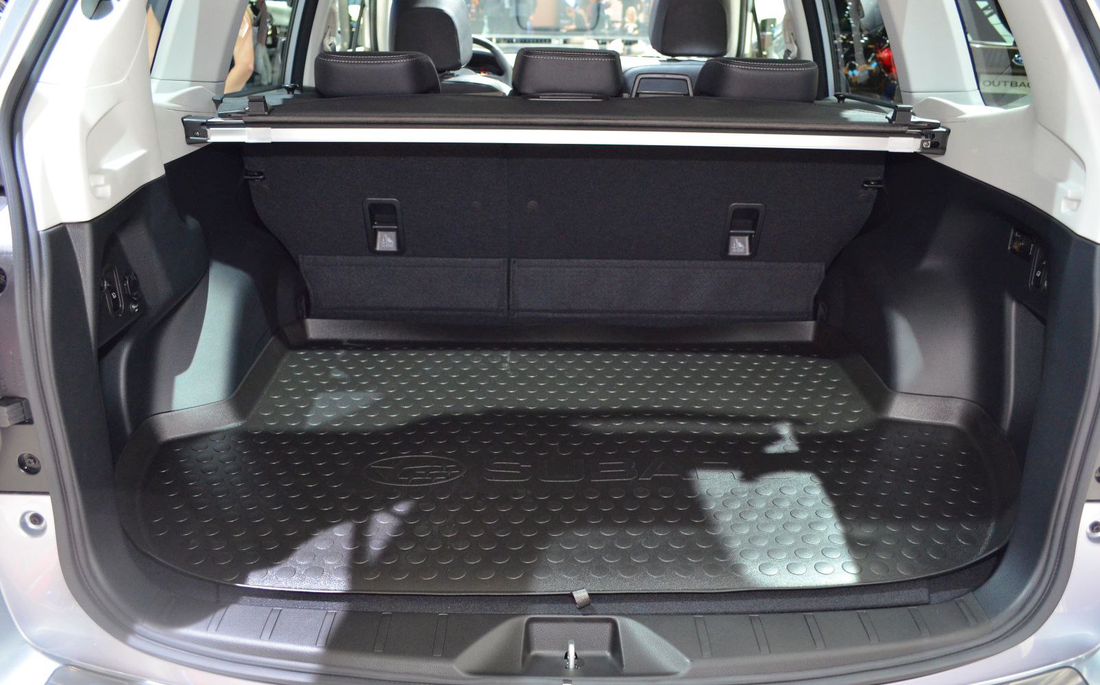 Spacious and durable trunk interior with protective mat