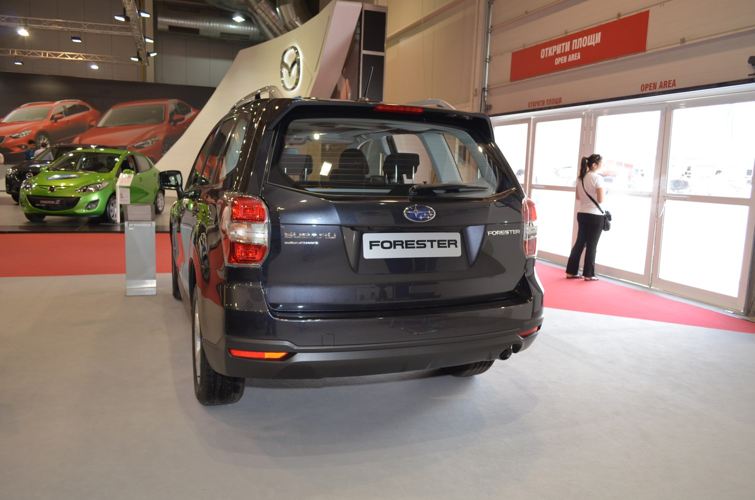 Rear view of a modern SUV with distinctive taillights and rear window.