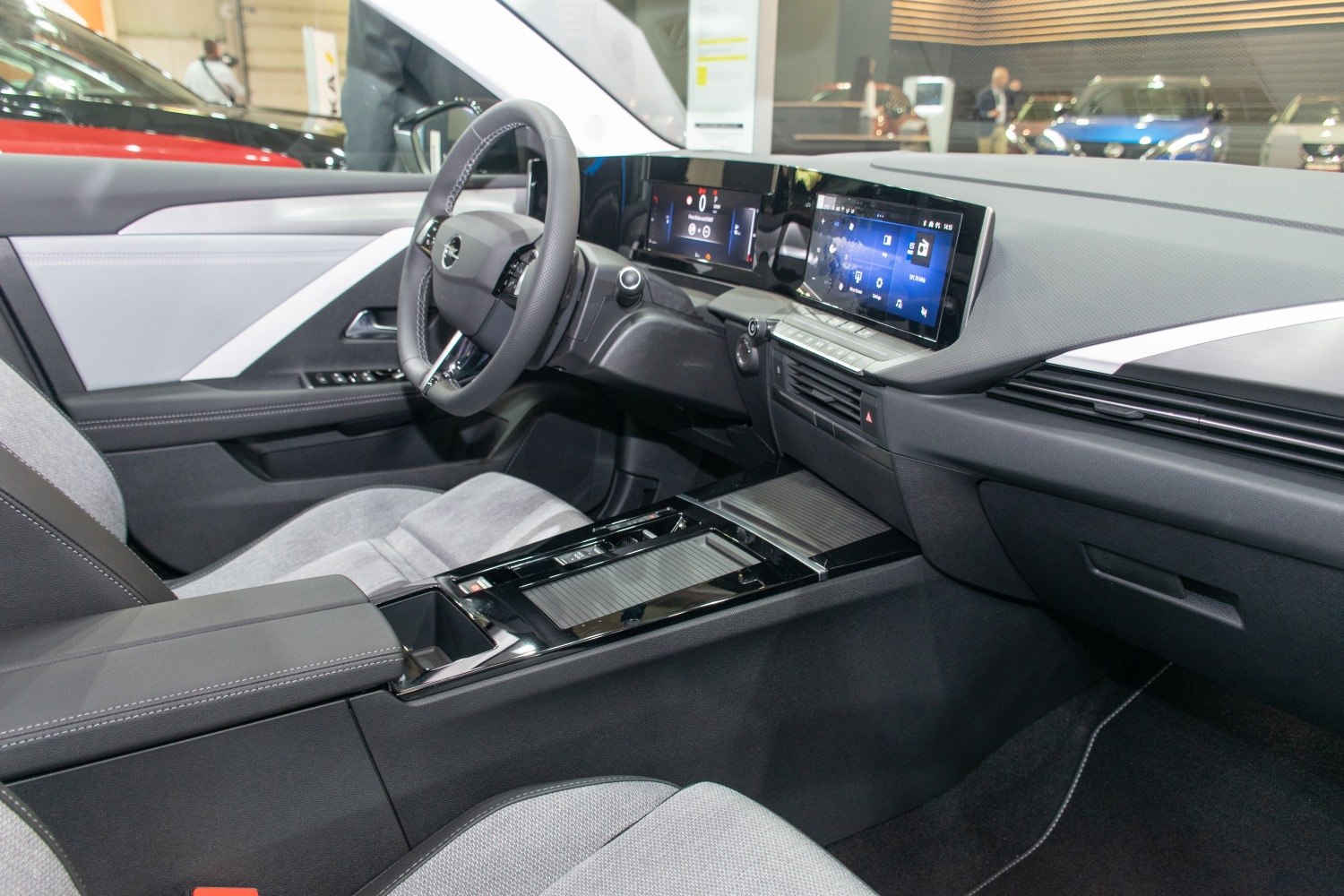 Luxury car interior with digital cluster and touchscreen panel