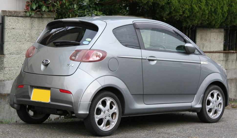 Rear and side profile of compact hatchback with rounded rear lights and silver finish