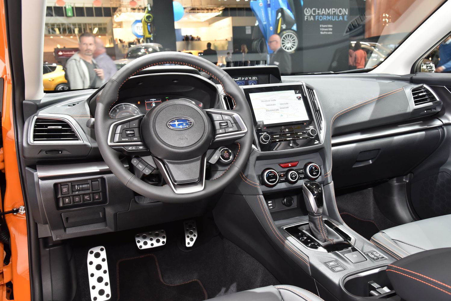 Multifunction steering wheel and advanced dashboard with infotainment and climate controls