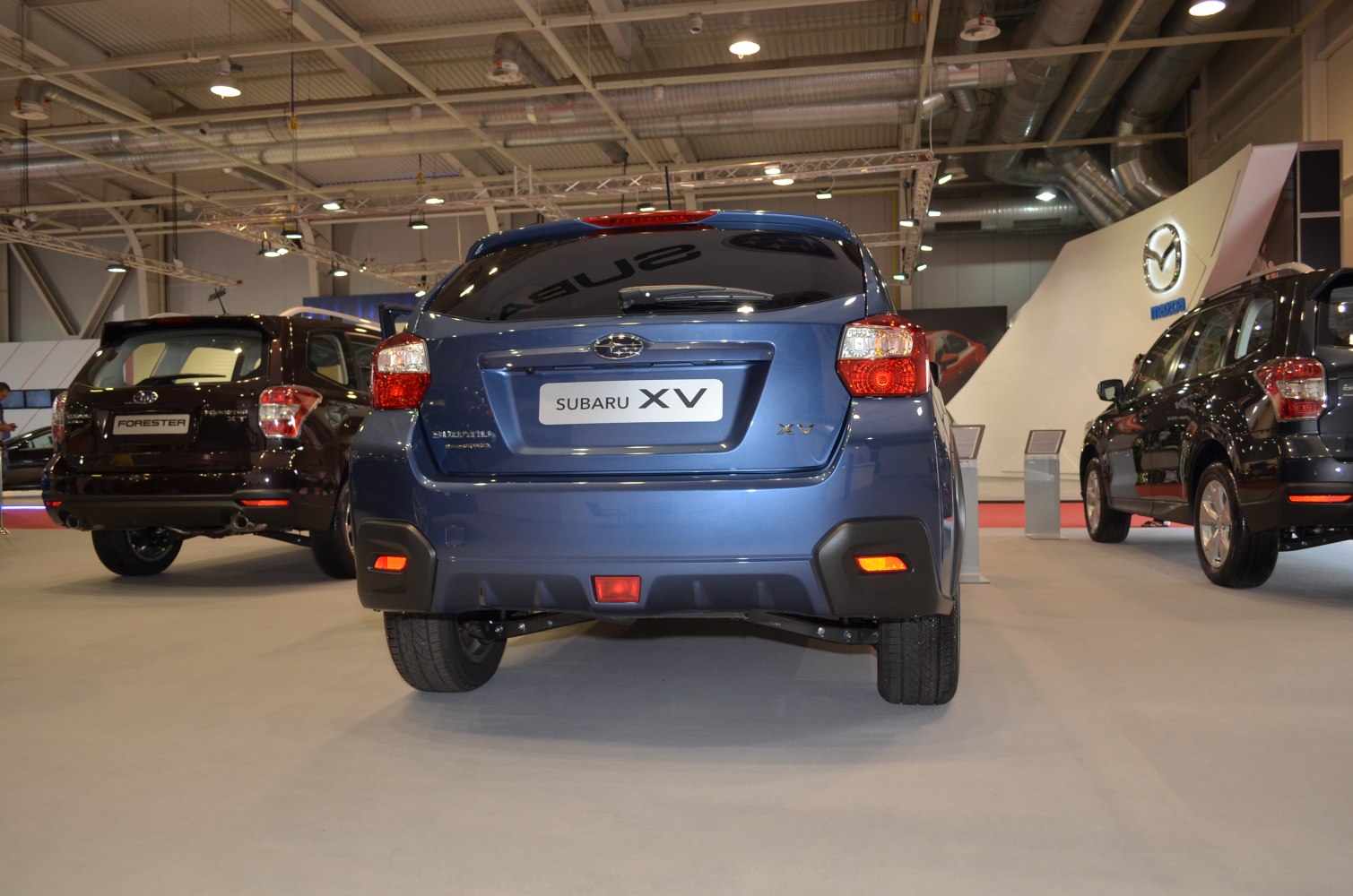 Rear view of a crossover with distinctive taillights and rear bumper.