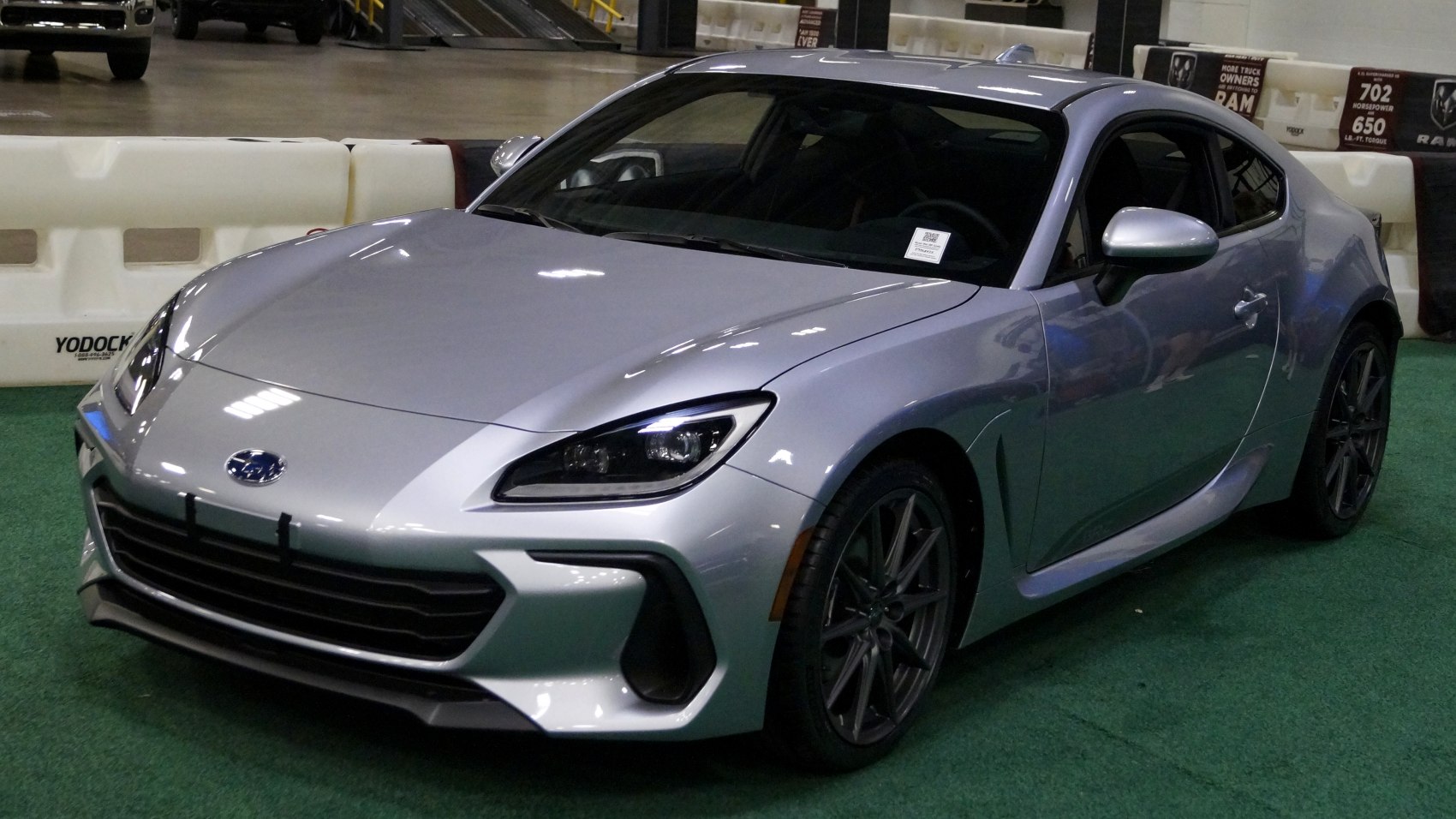 Sports coupe with sharp front grille and aggressive LED headlights