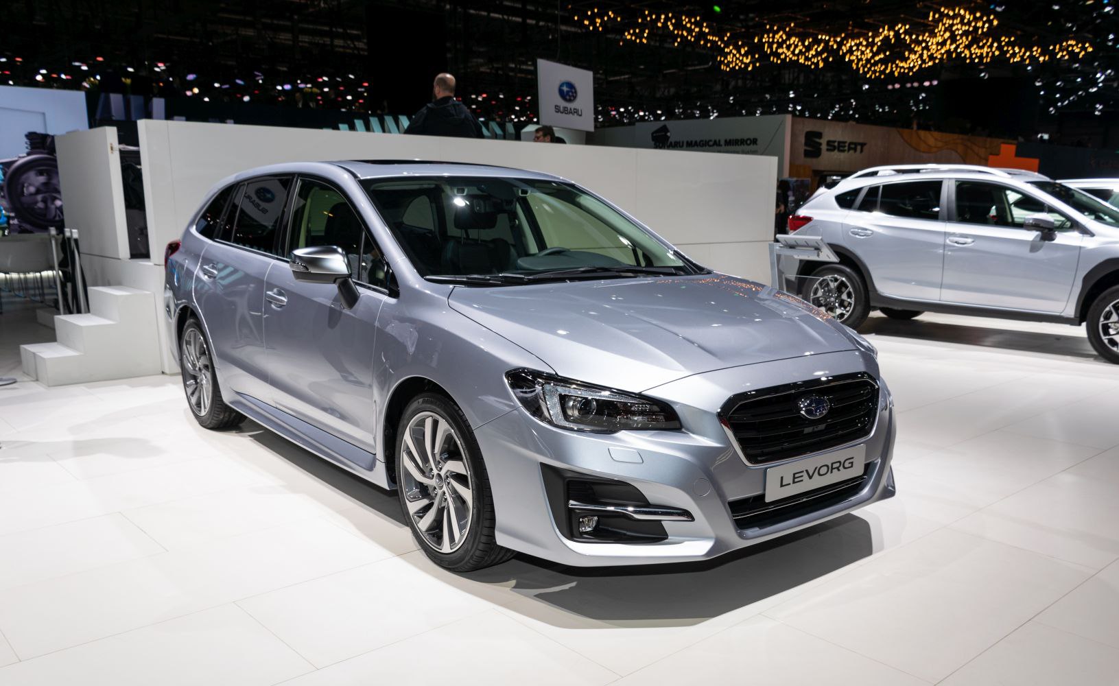 Sleek headlights and sporty front fascia on a modern station wagon