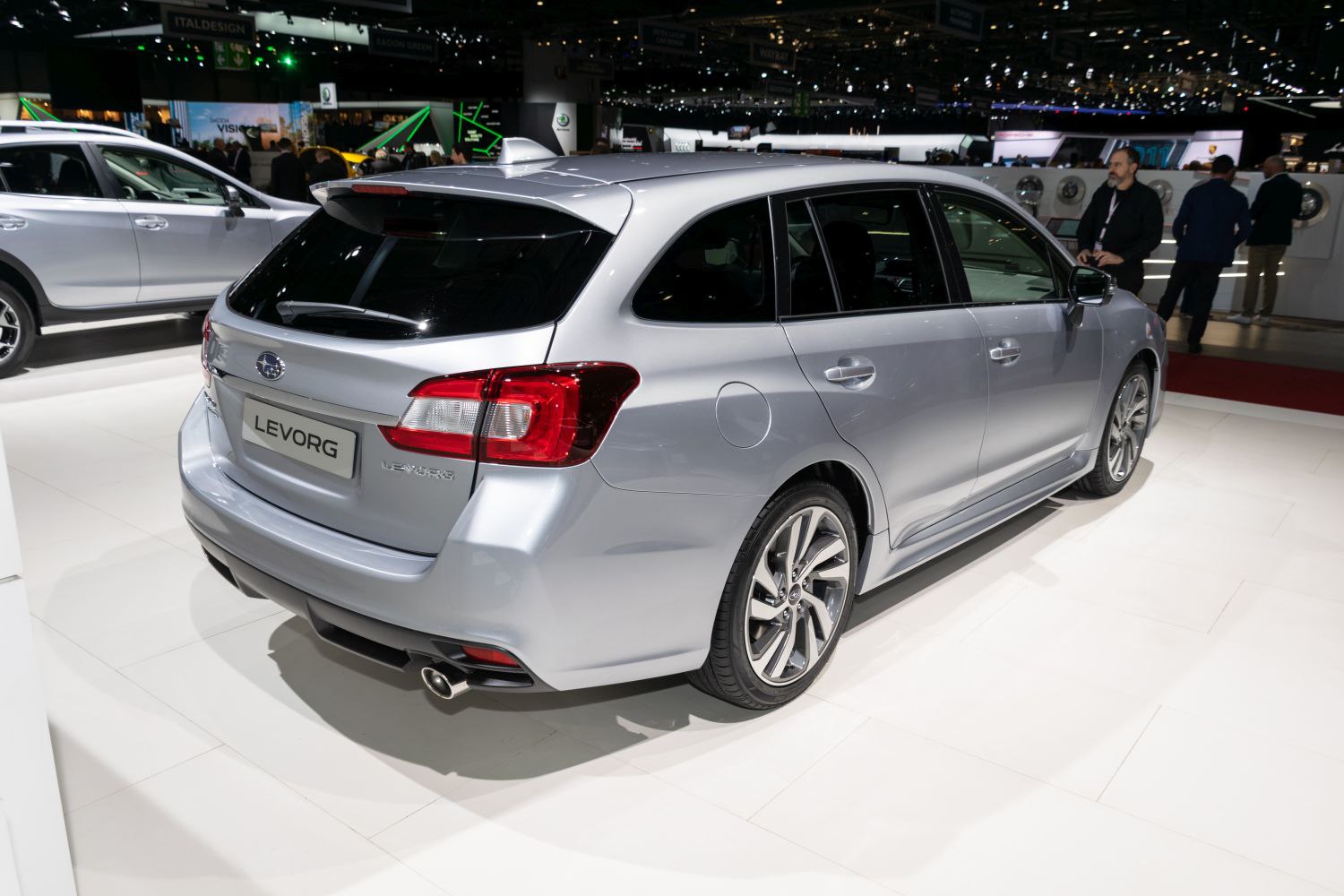 Rear and side view of a sleek silver wagon with modern taillights and stylish alloy wheels