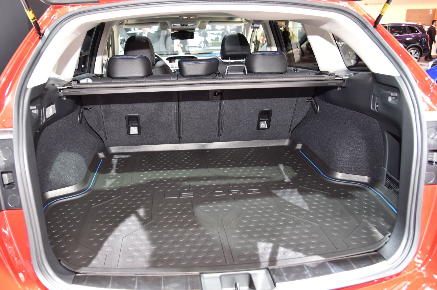 Spacious trunk interior with protective floor mat