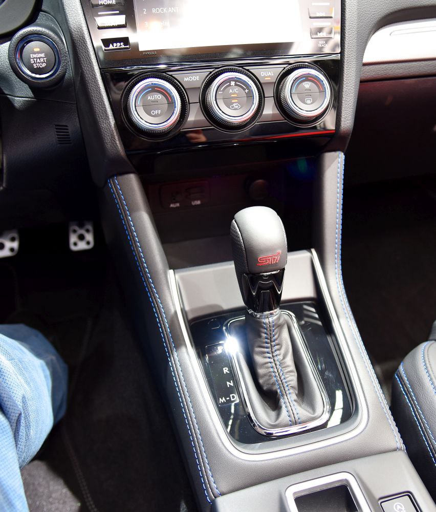 STI gear shift knob and climate control dials with detailed stitching
