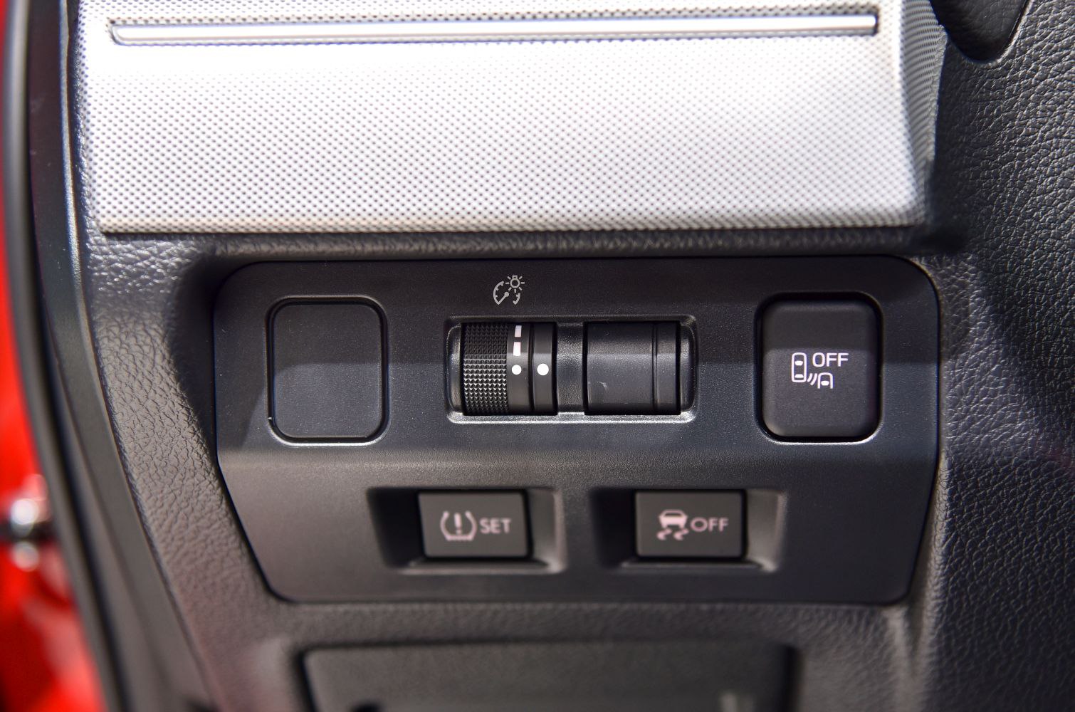 Interior control panel with adjustment dials and buttons