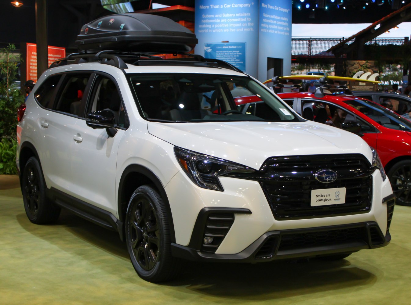 SUV with roof cargo box and modern front design