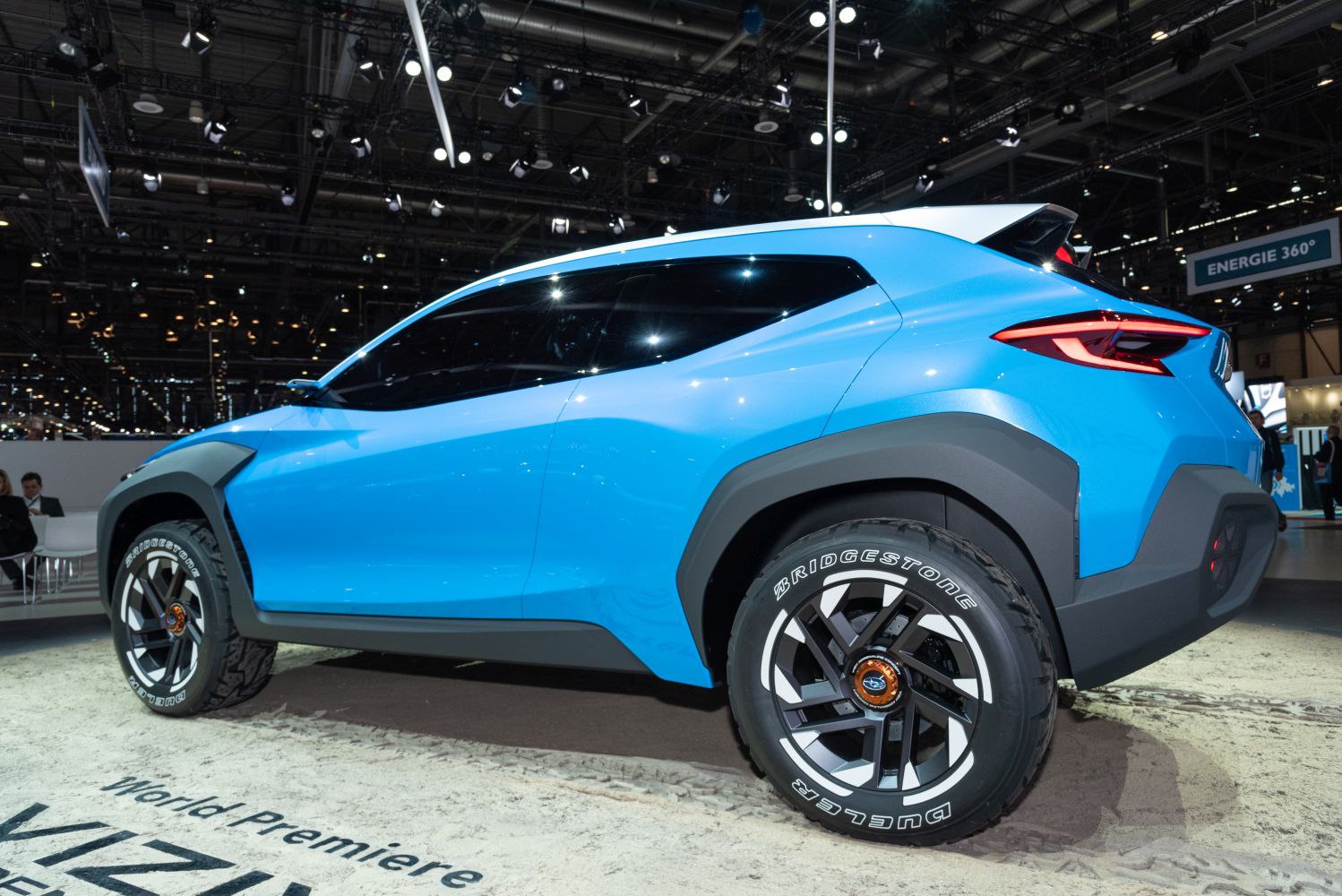 Futuristic SUV rear side with bold wheel arches and LED taillights