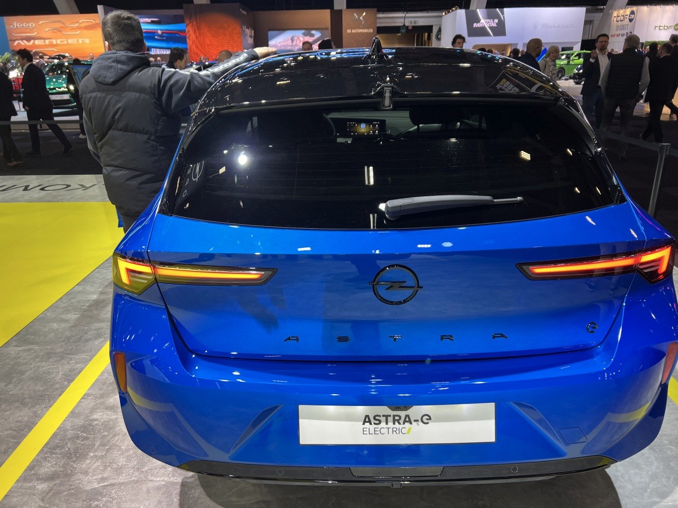 Rear view of a modern hatchback with LED taillights and rear window wiper.