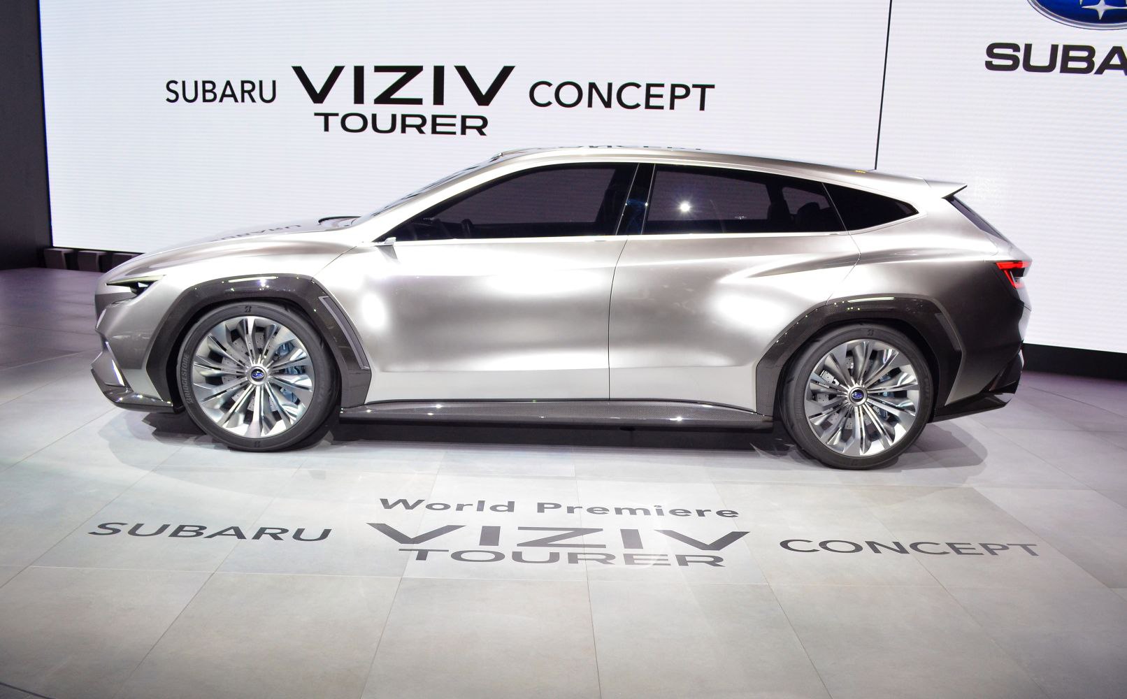 Sleek side profile with aerodynamic design and large alloy wheels