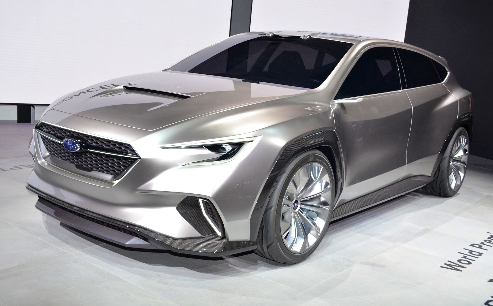 Aggressive front fascia with slim LED headlights and large alloy wheels