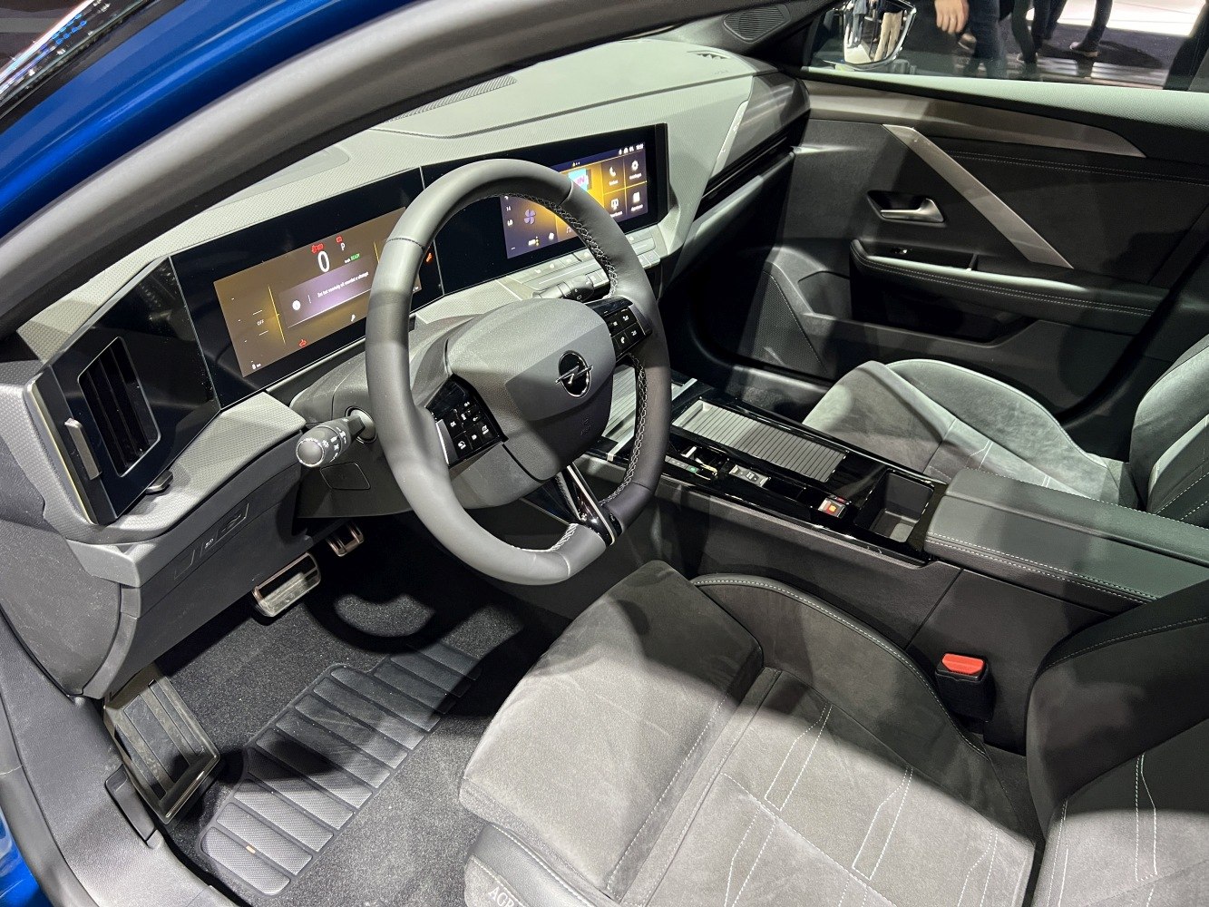 Digital instrument cluster with multifunction steering wheel and modern interior design