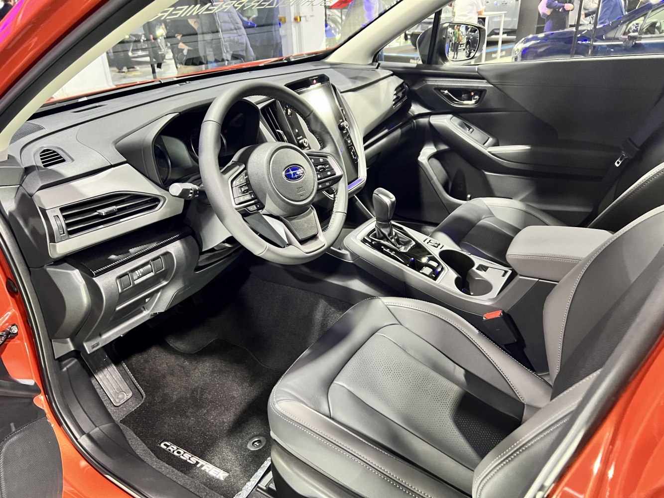 Modern dashboard, steering wheel, front bucket seats