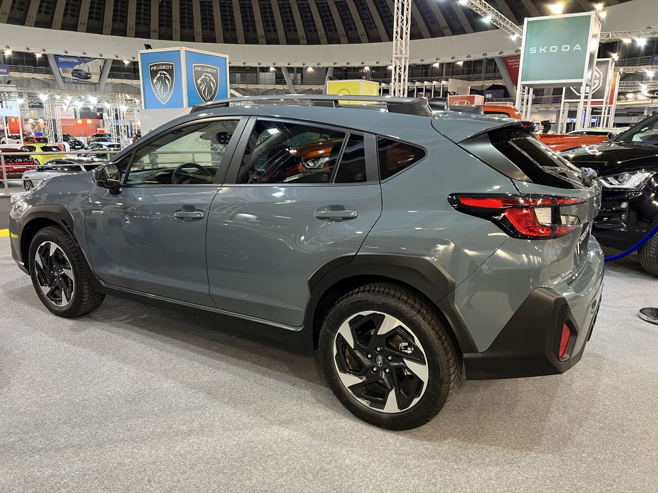 Side profile and rear design of a compact SUV with distinctive rear lights and modern wheels