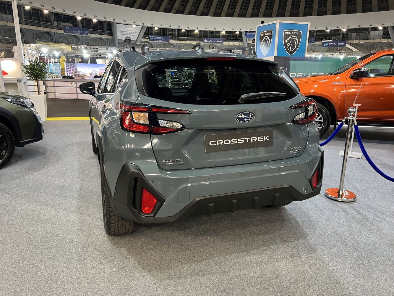 Rear view of a modern SUV with distinctive tail lights and rear bumper design