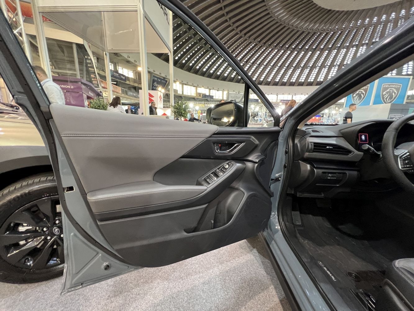Interior door panel and dashboard with controls and trim