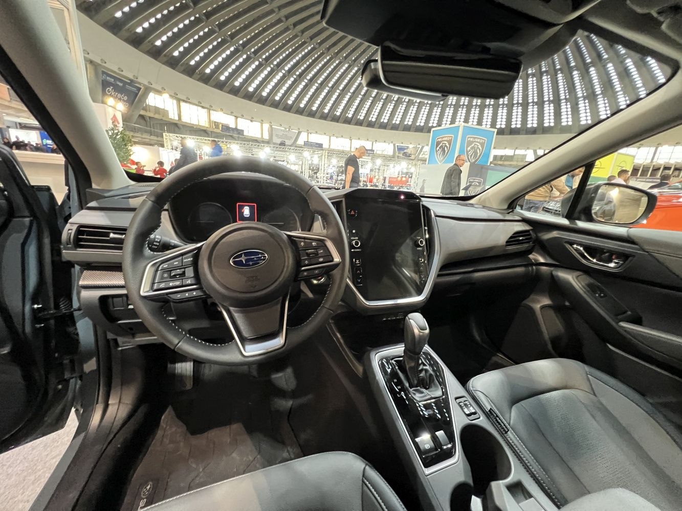Interior dashboard with touchscreen and multifunction steering wheel