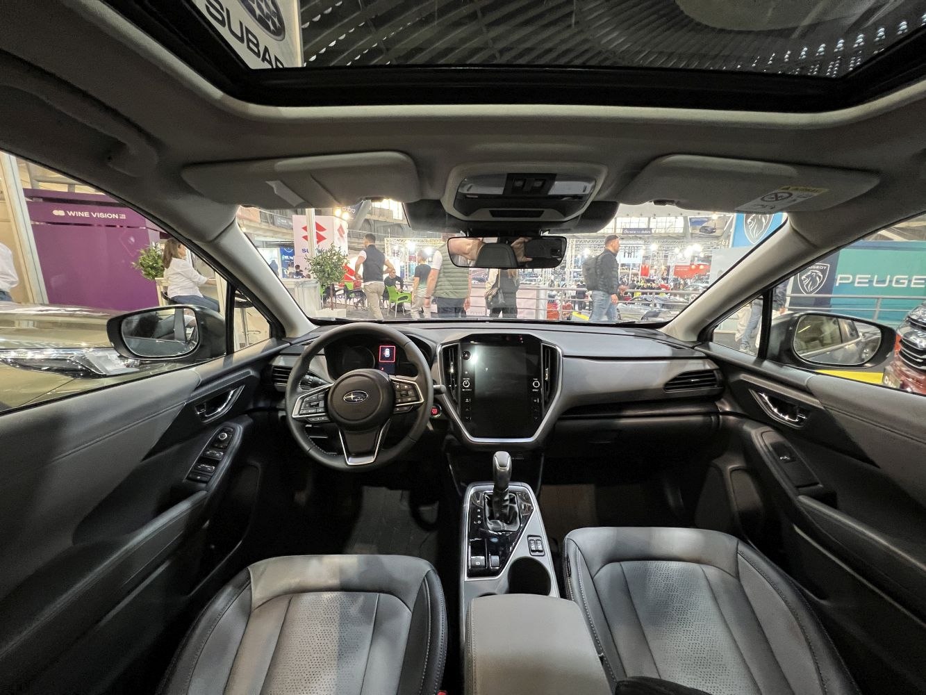 Modern dashboard with infotainment screen and panoramic sunroof