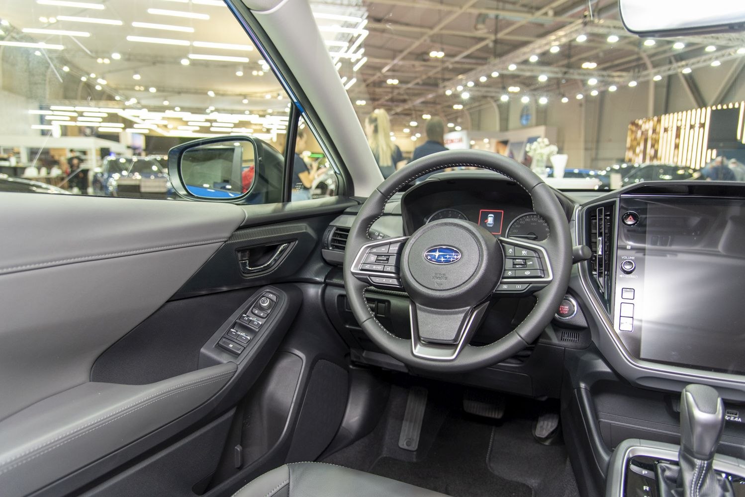 Modern steering wheel and digital dashboard with multimedia touchscreen