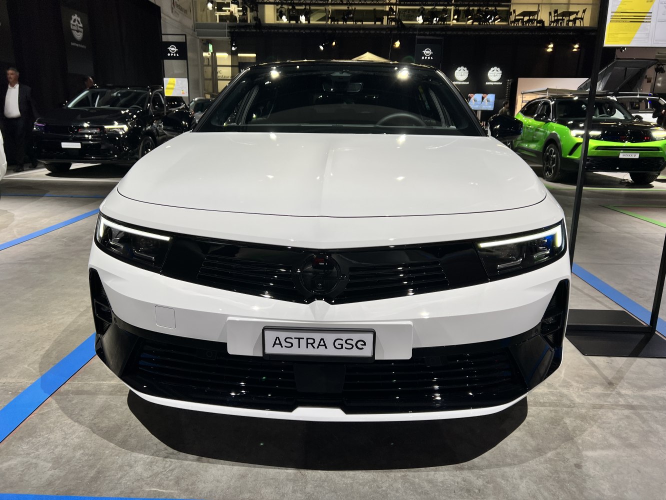 Front view with sleek LED headlights and black grille
