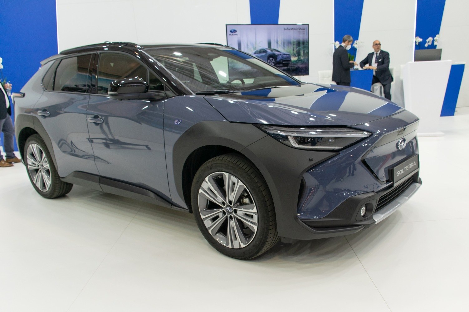Modern electric SUV with aerodynamic front design and alloy wheels