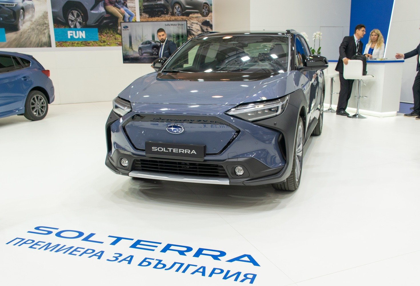 Front view of an electric SUV with modern grille and sleek headlights.