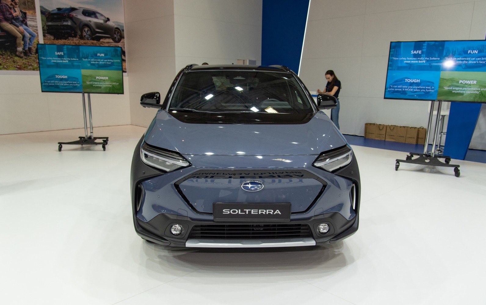 Front view of electric SUV with LED headlights and fog lights
