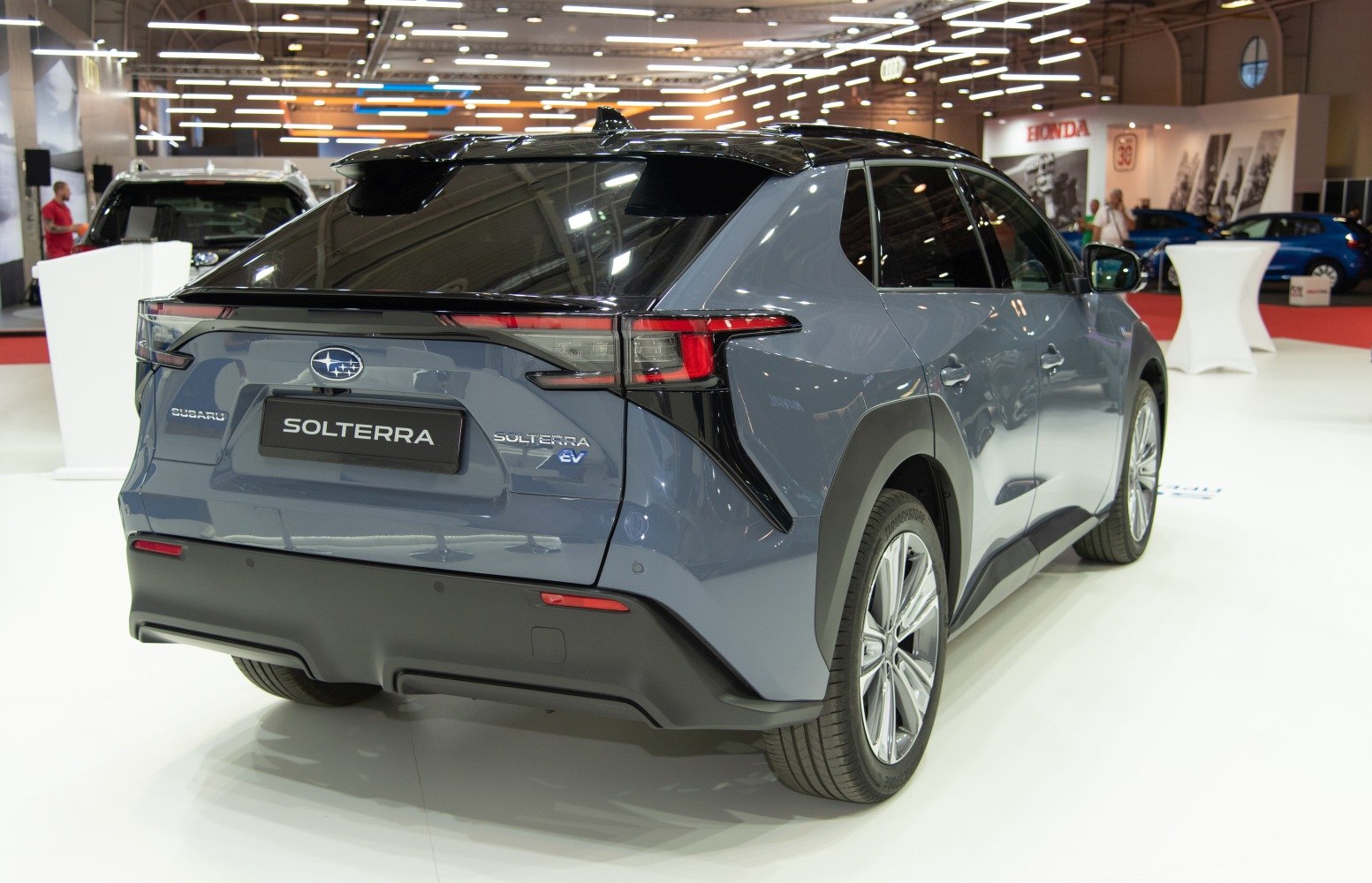 Rear view of electric SUV with sleek taillights and bold bumper