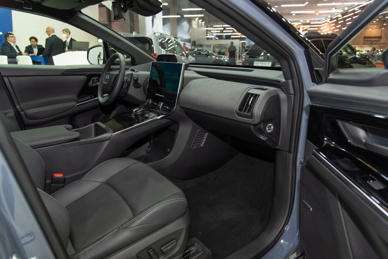 Modern car interior with digital dashboard and central touchscreen display
