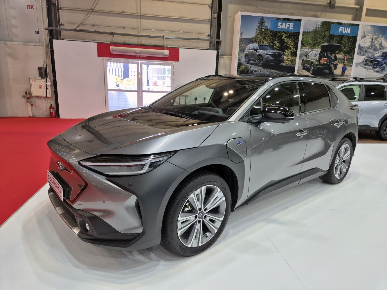 Front-side view of electric SUV with aerodynamic design and LED headlights