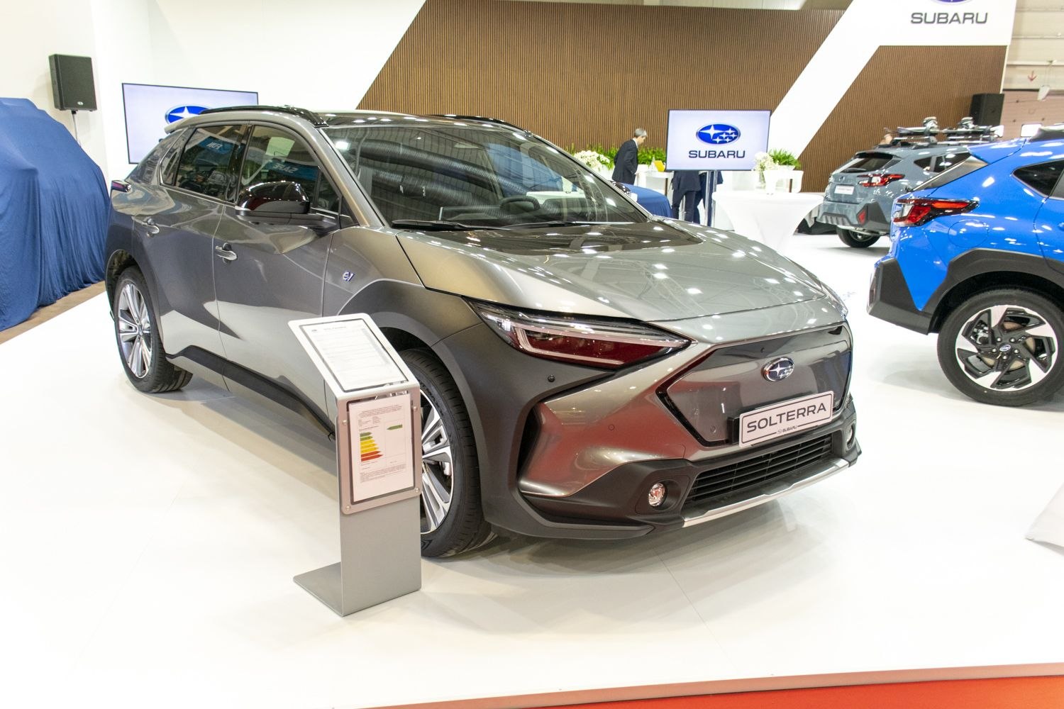Sleek electric SUV front with distinctive headlights
