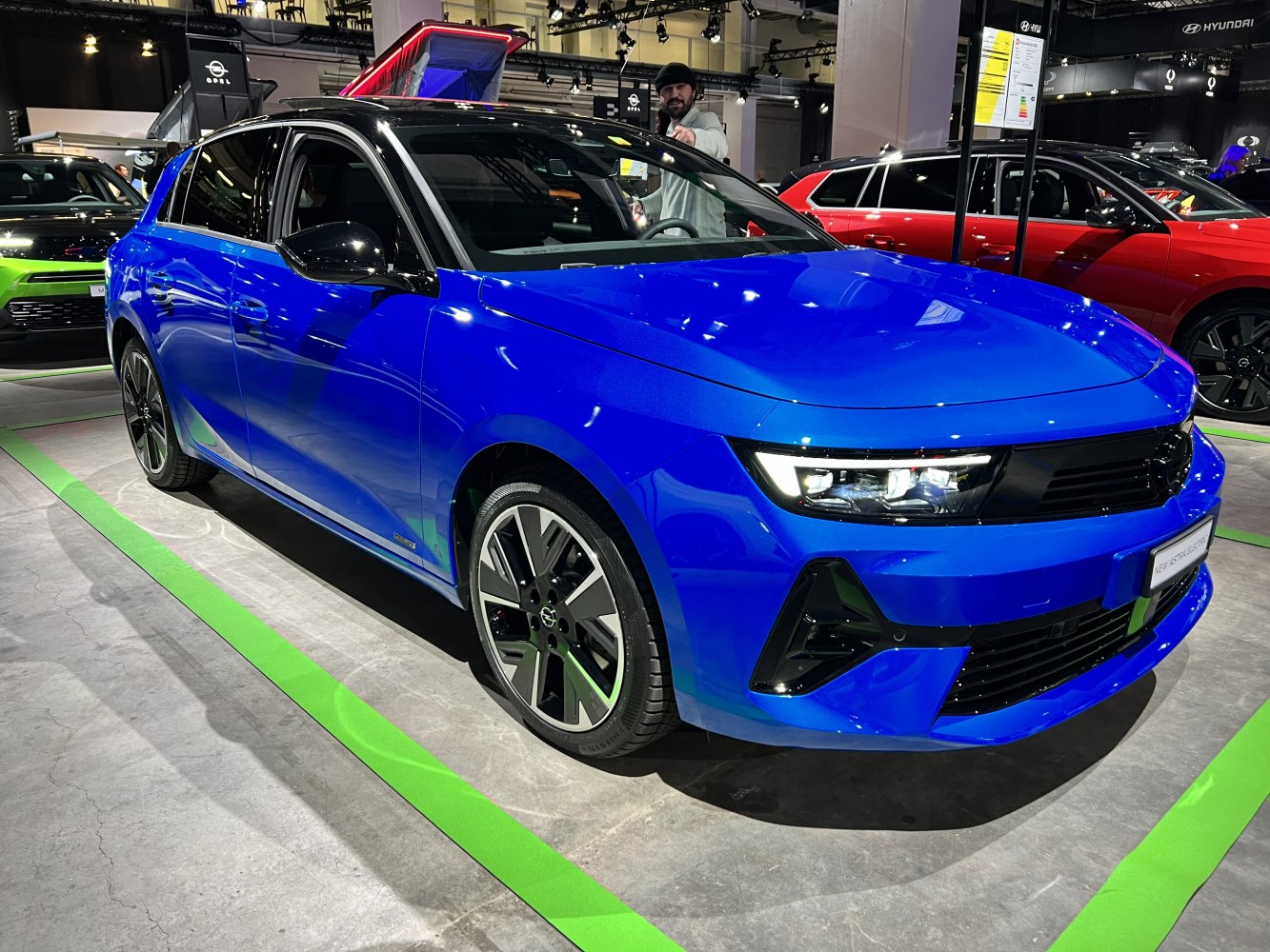 Blue 5-door hatchback with alloy wheels and LED headlights
