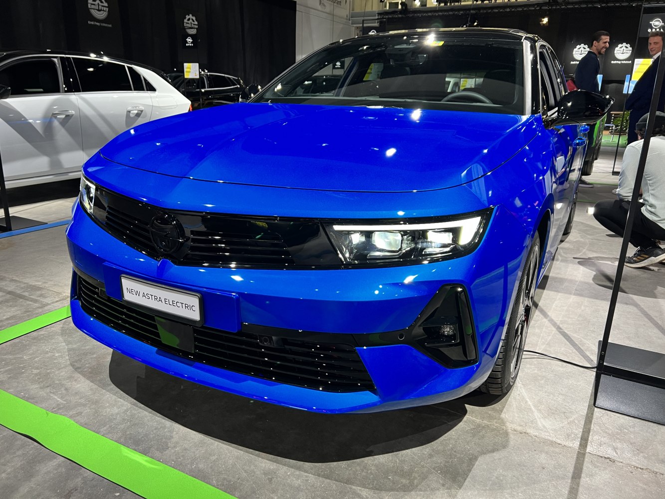 Front view with sleek LED headlights and smooth grille