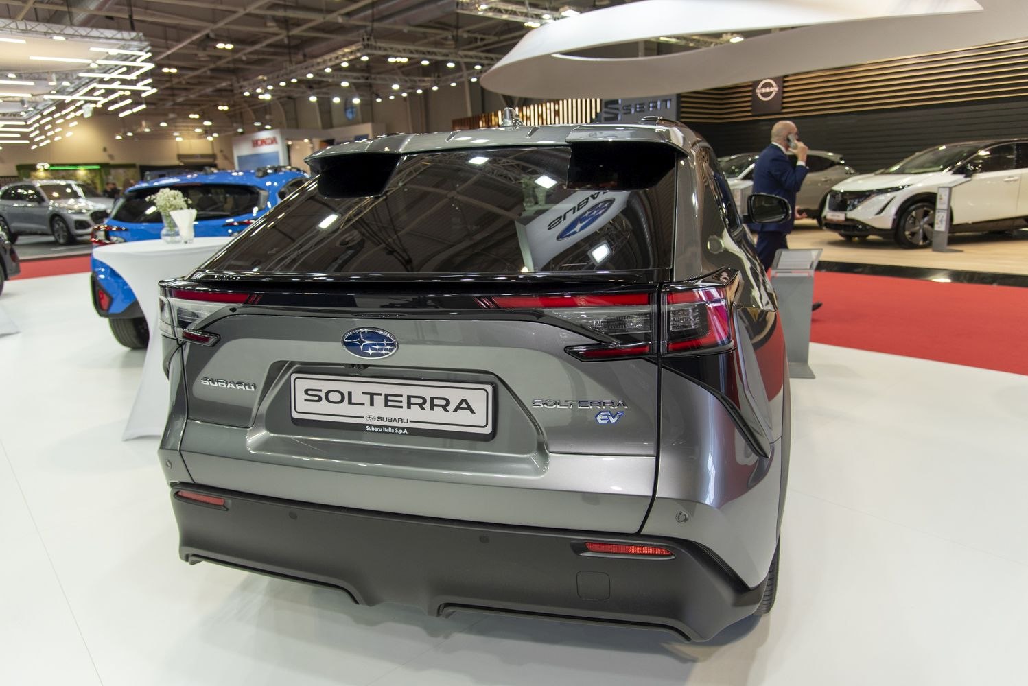 Rear view with sleek taillights and modern electric SUV design