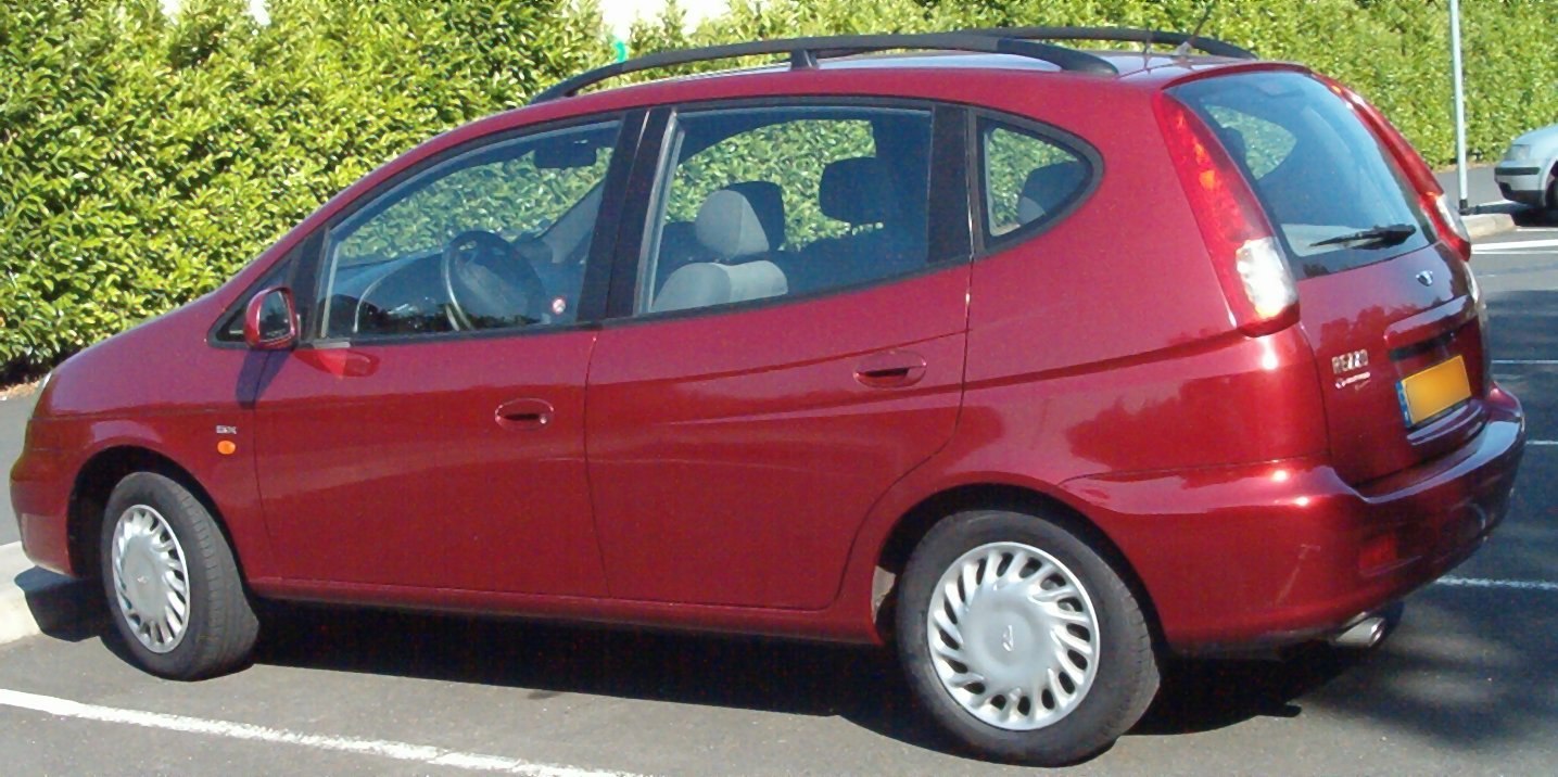 Red multipurpose vehicle with side profile and rear view