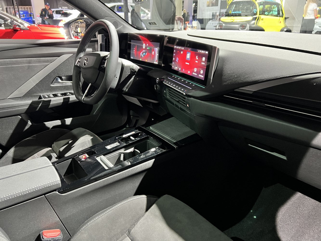 Dual digital instrument and infotainment displays with sleek dashboard and modern controls