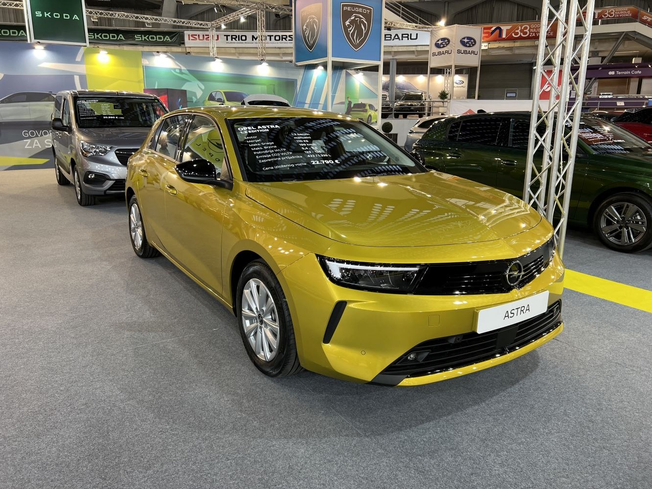 Front view of compact hatchback with LED headlights and aerodynamic styling