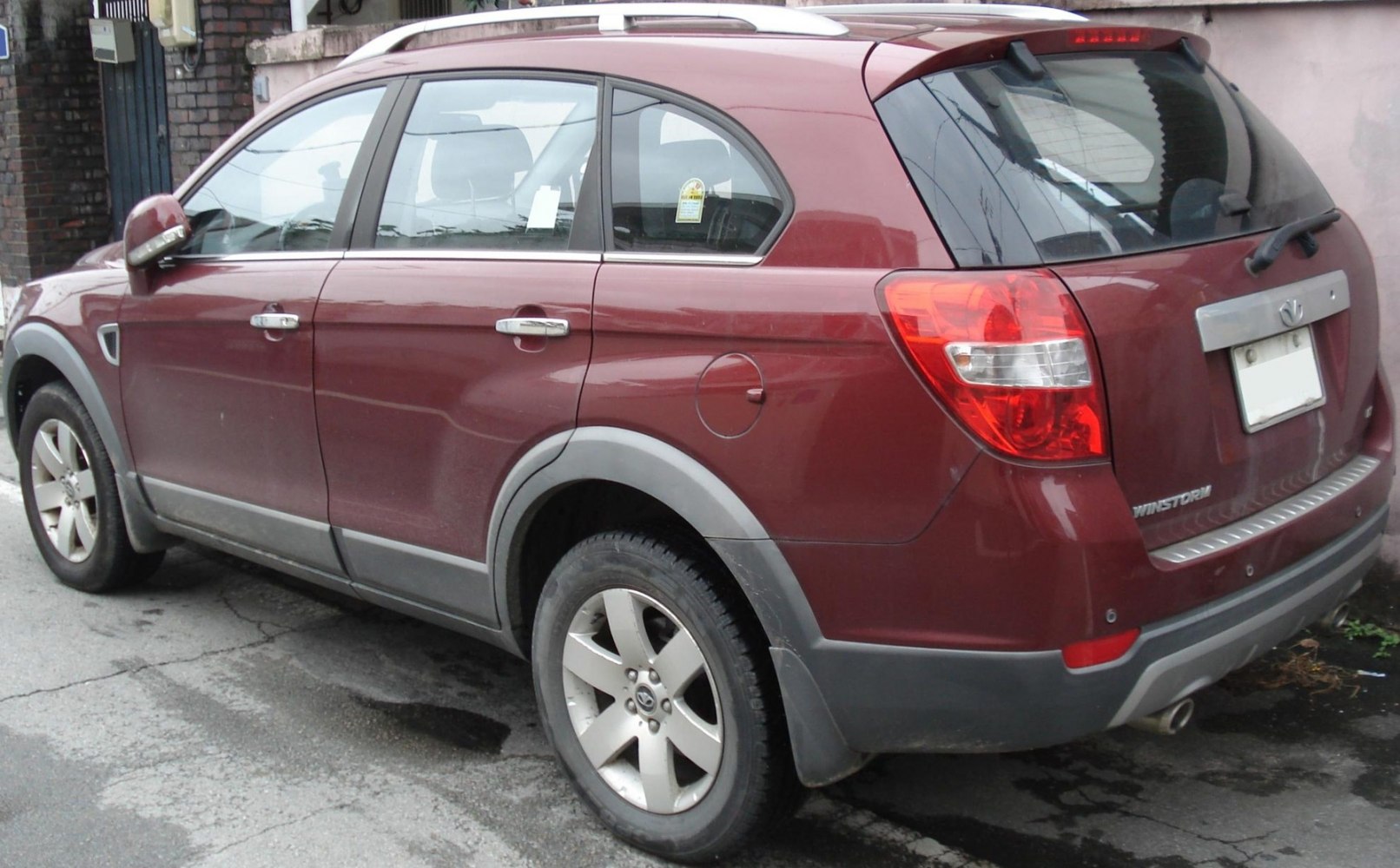 Rear and side profile of an SUV with distinct tail lights and wheel arches
