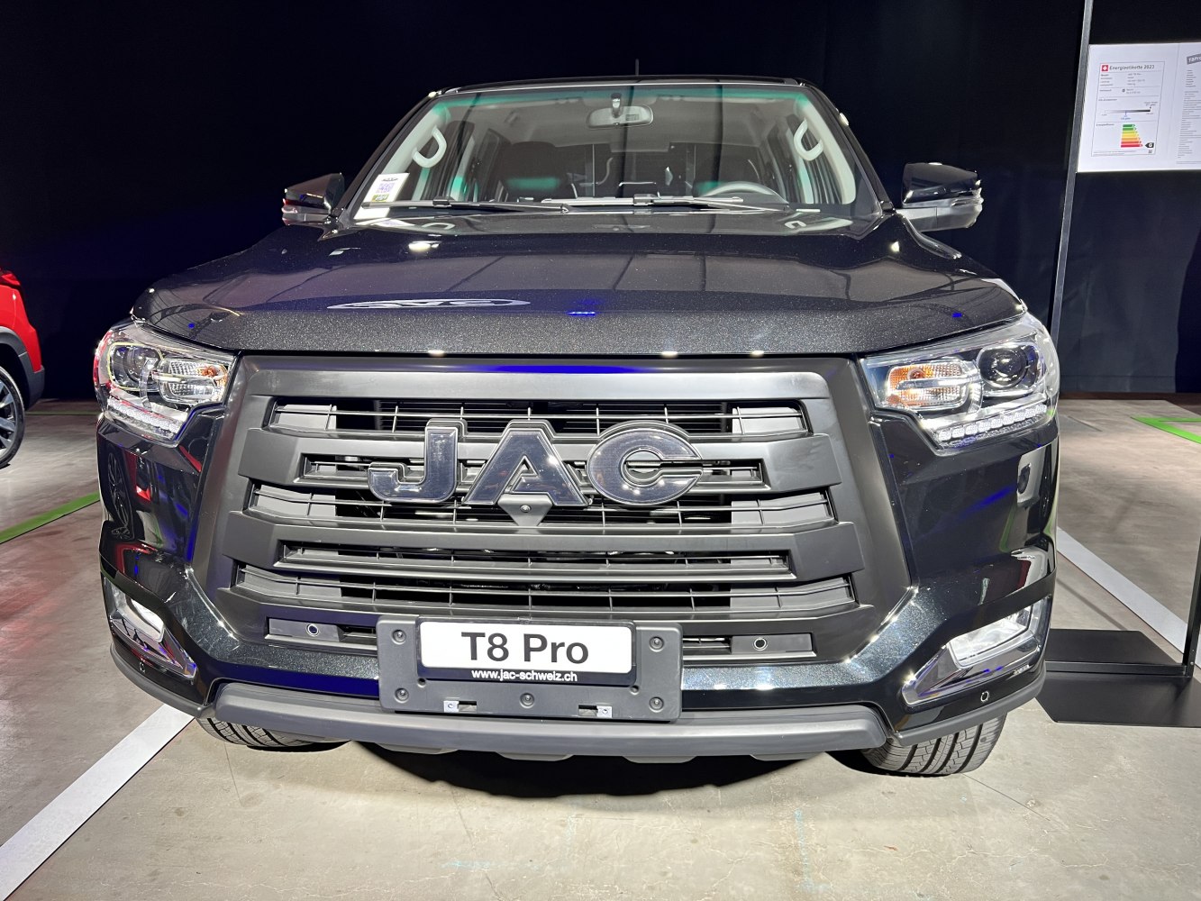 Bold front grille and modern headlights of a pickup truck