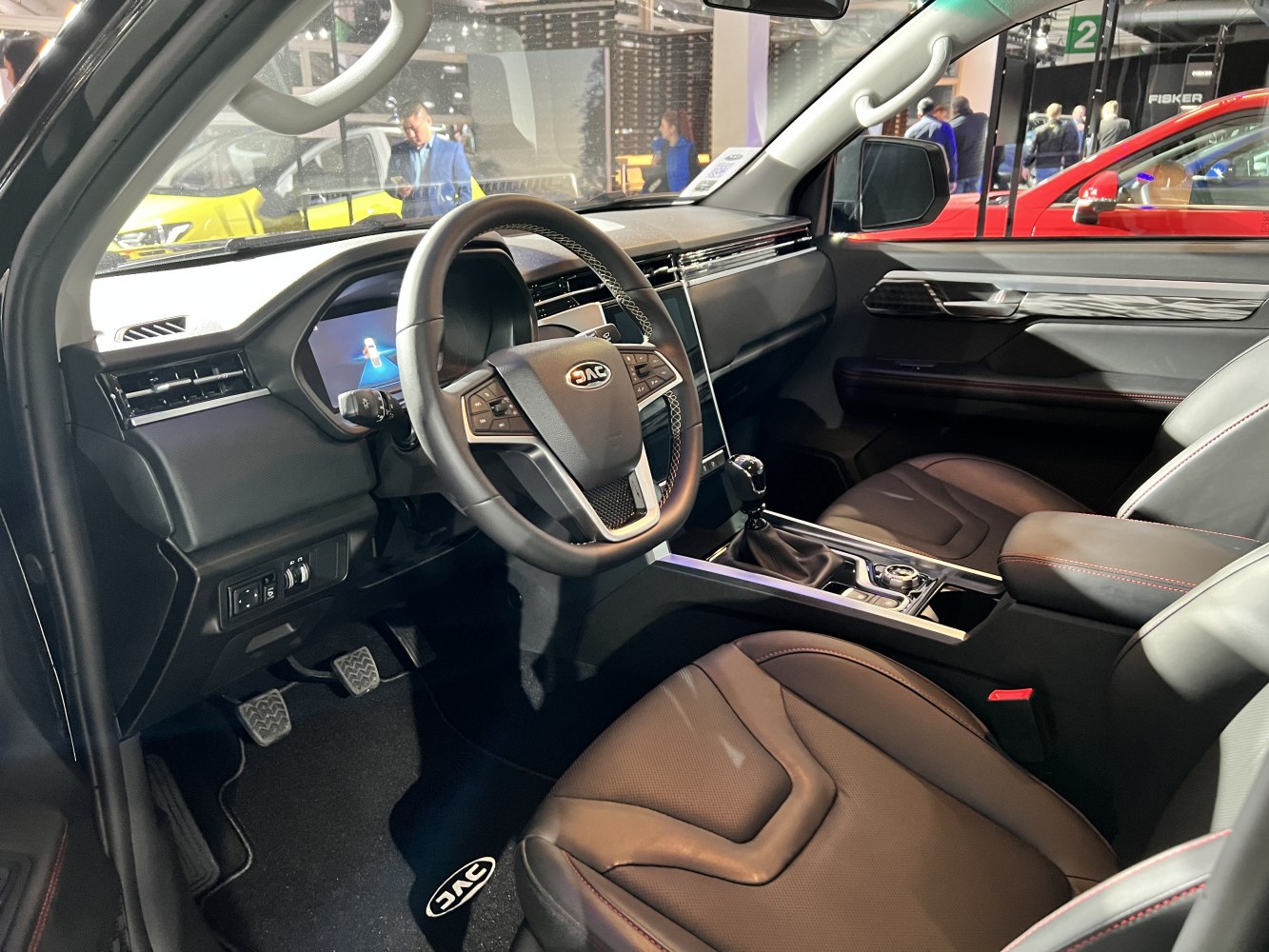 Modern steering wheel and large touchscreen display in vehicle interior