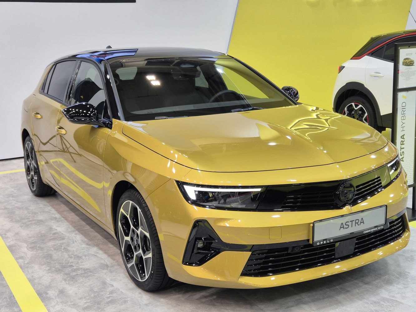 Front view showing LED headlights and alloy wheels
