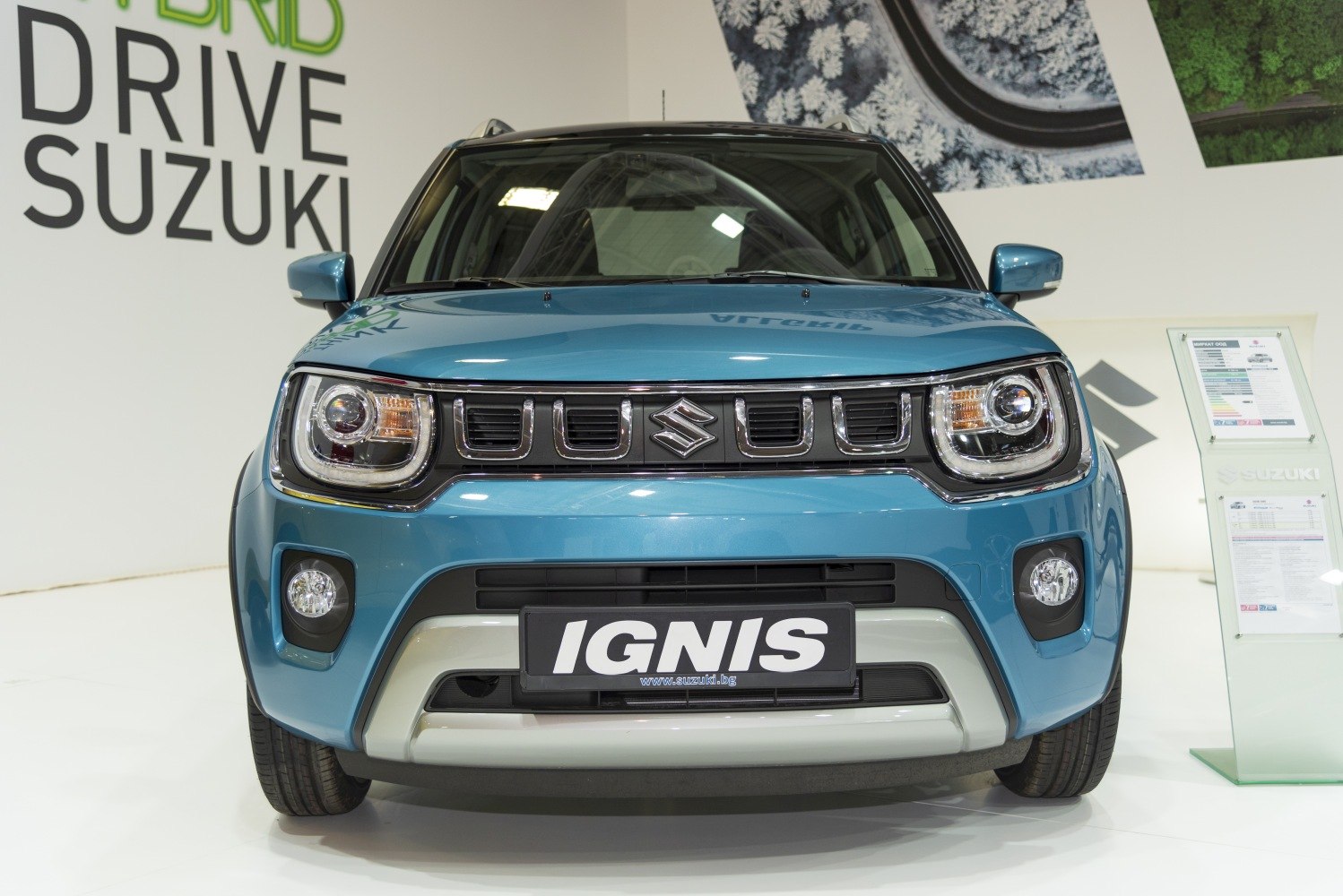 Front view with distinctive grille, headlights, and fog lights.