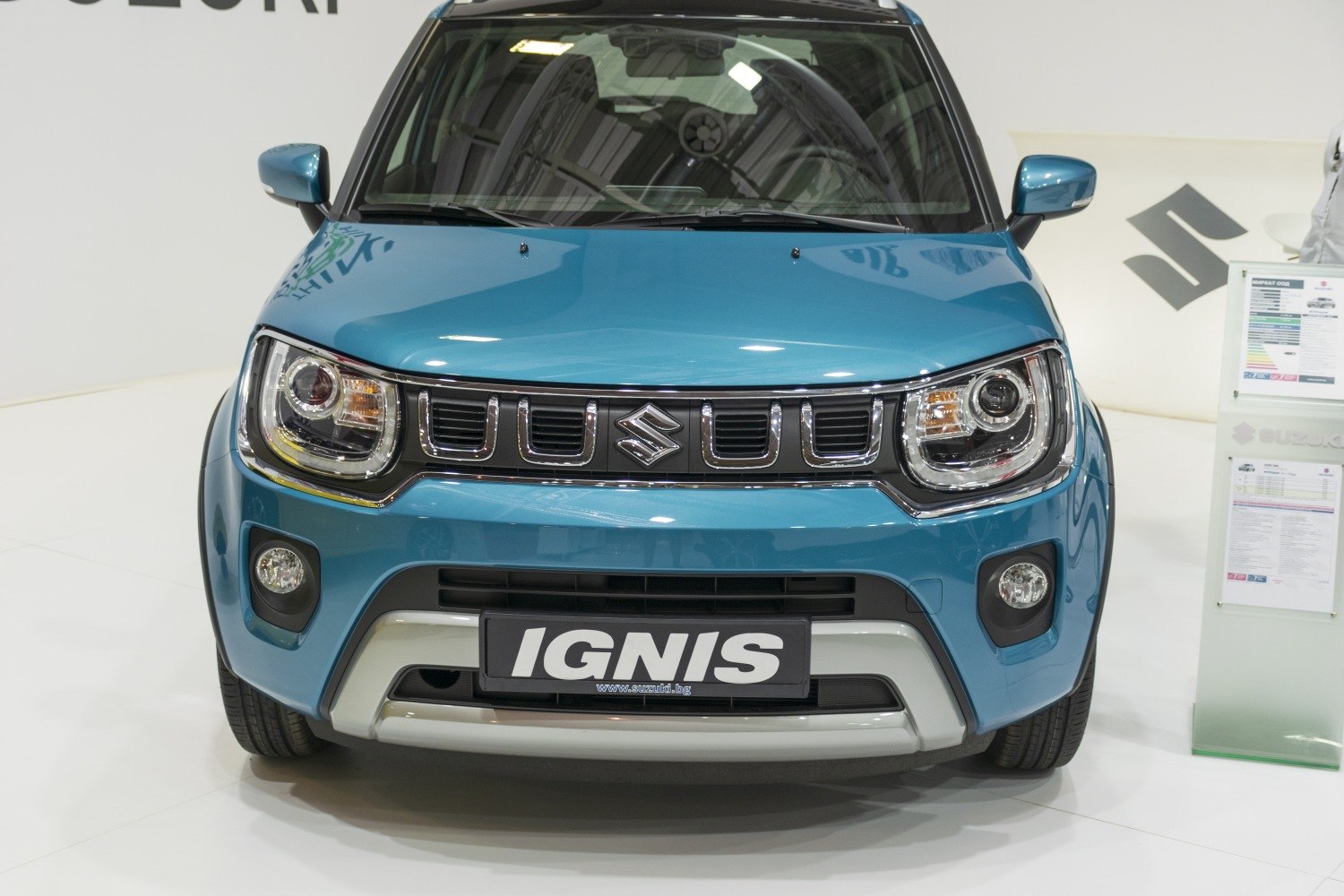 Front view with distinctive headlights and grille design